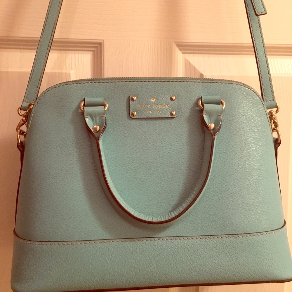 Where with everything Kate Spade turquoise bag.